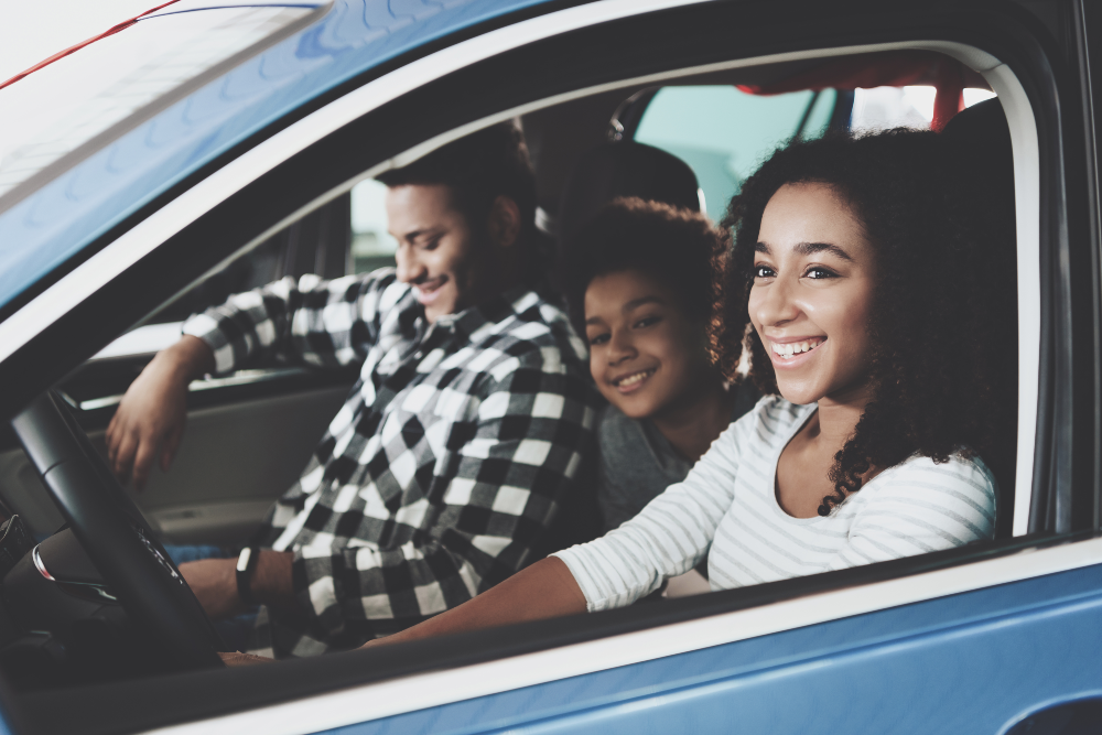 A happy family has a great tip because they rented a car from Midwest Car Share!